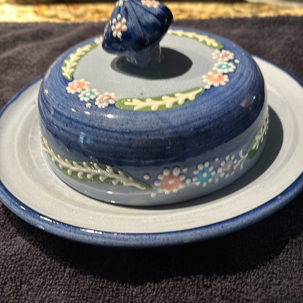 Pottery made Butter Dish with a design of flowers